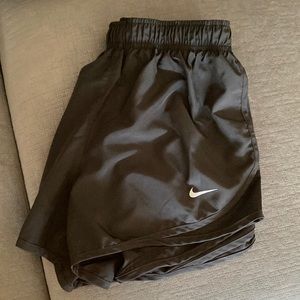 Nike Women’s Nike athletic shorts. 2 pr .. each pr $15.00